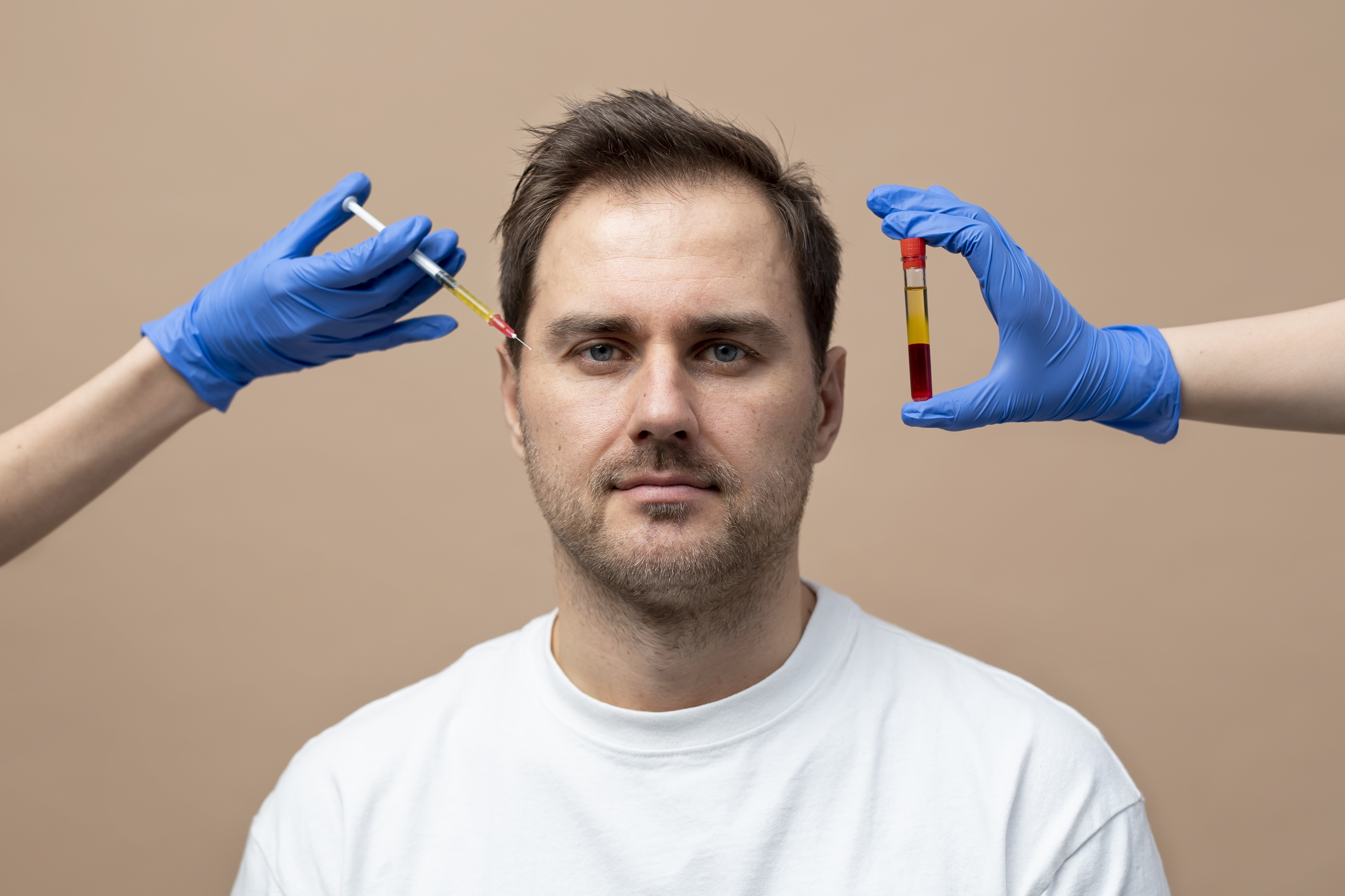 front-view-smiley-man-getting-prp-injection